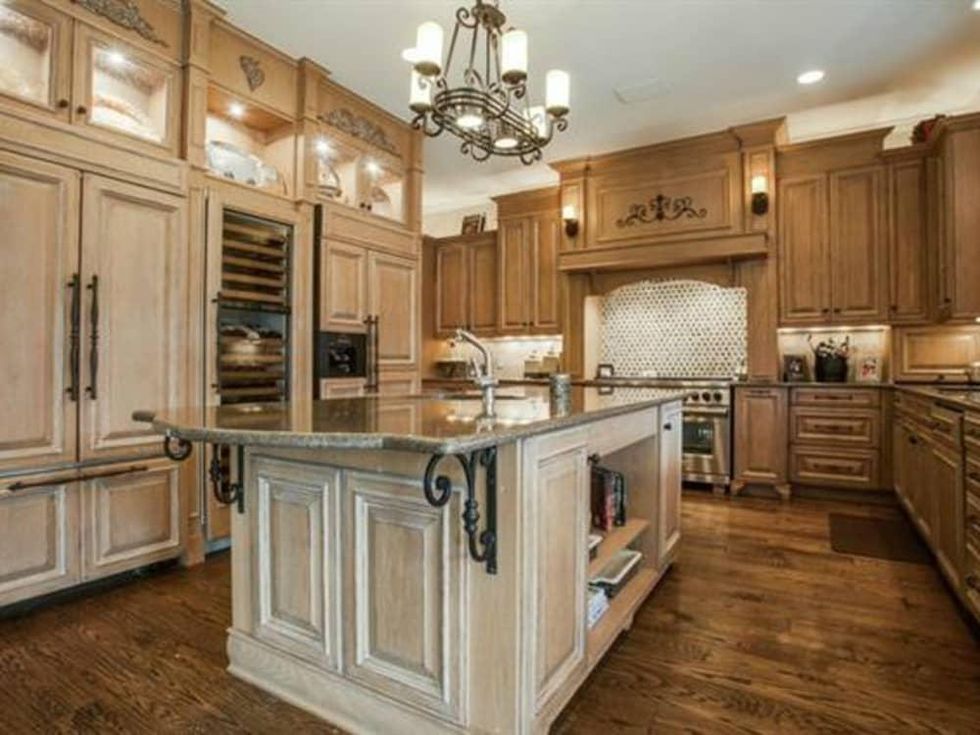 6047 Woodland Dr. house for sale in Dallas