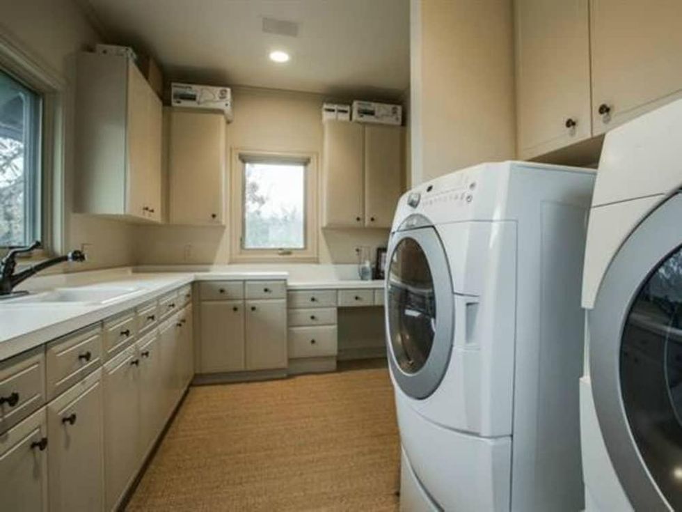 6047 Woodland Dr. house for sale in Dallas