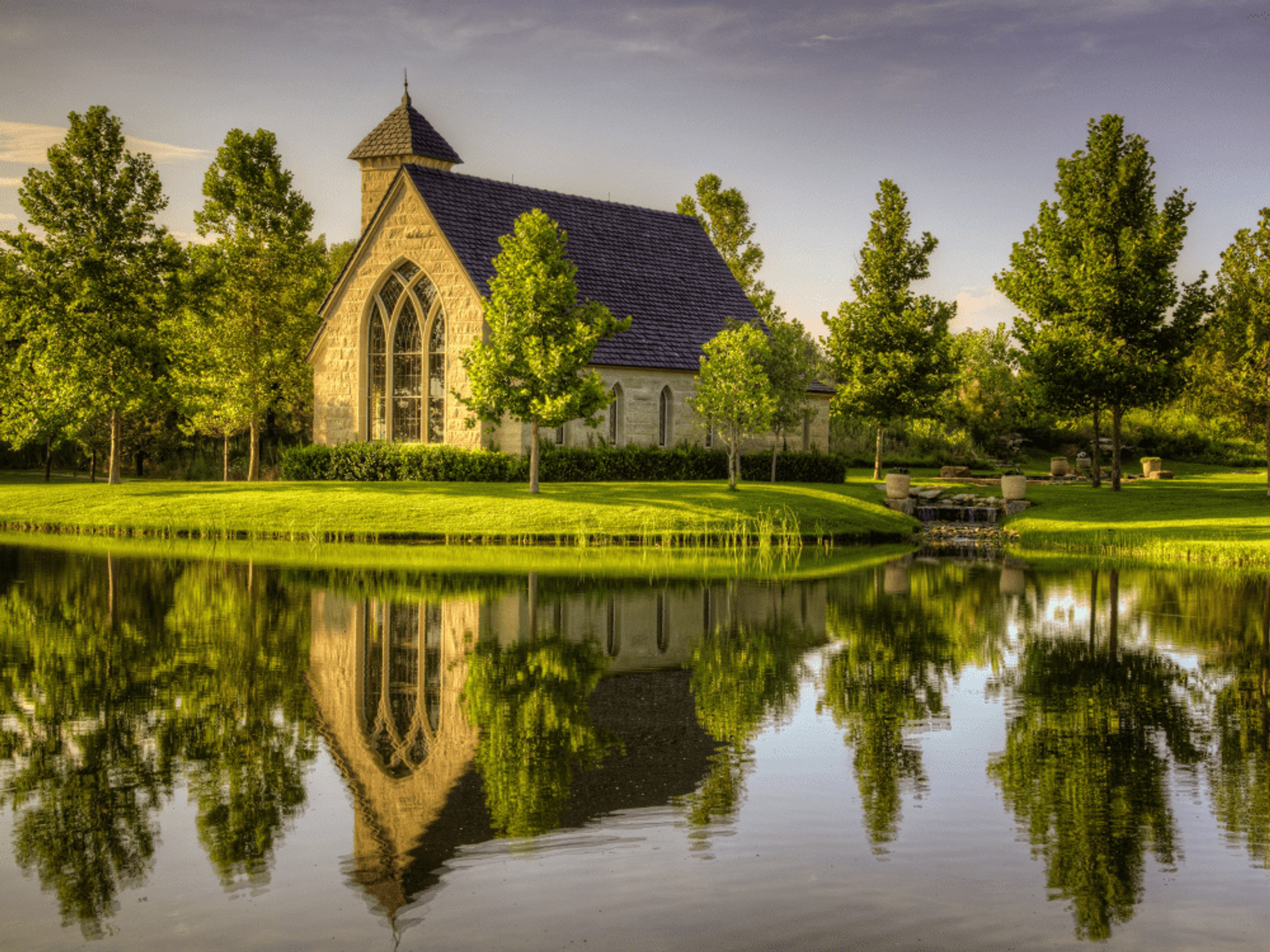 A chapel sits beside a lake at Mesa Vista Ranch.