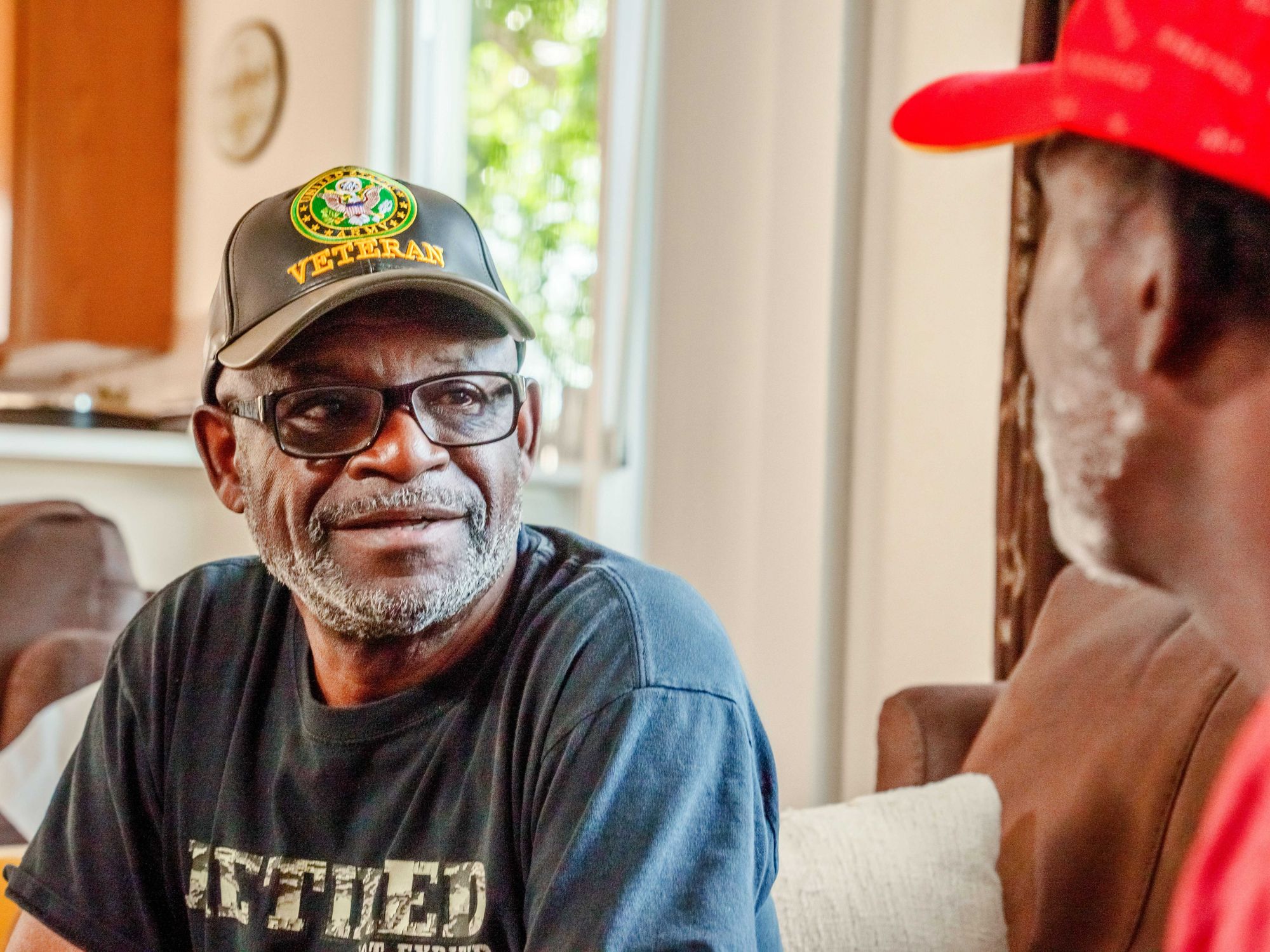 A veteran having a conversation in his home