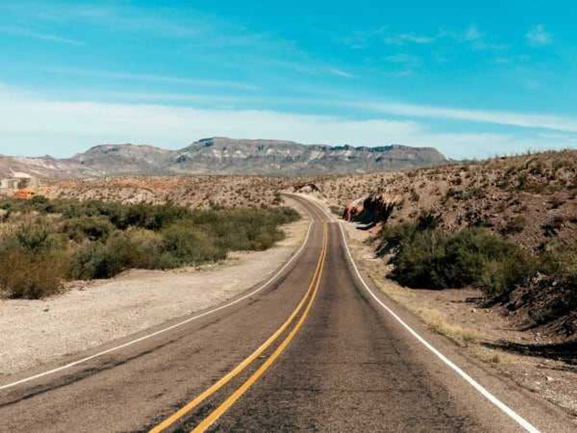 A winding road through Ross Maxwell Scenic Drive in Big Bend, Texas