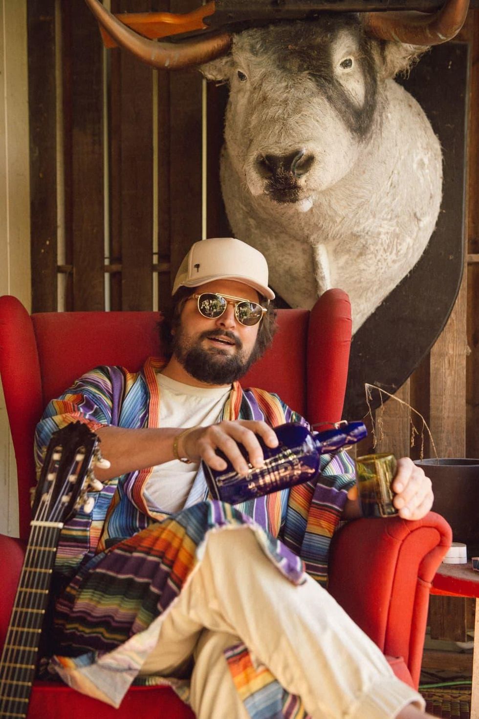 Alexander Beggins pours a glass of Desert Door sotol.
