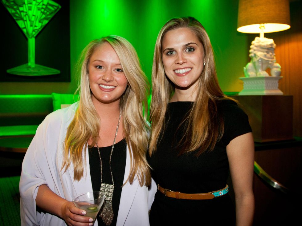 Alli McGuinness (left) and McKenzie Mundy, j r ewing bourbon launch party
