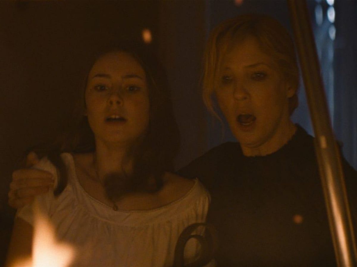 Amelia Crouch and Kelly Reilly in The Cursed. - CultureMap Dallas