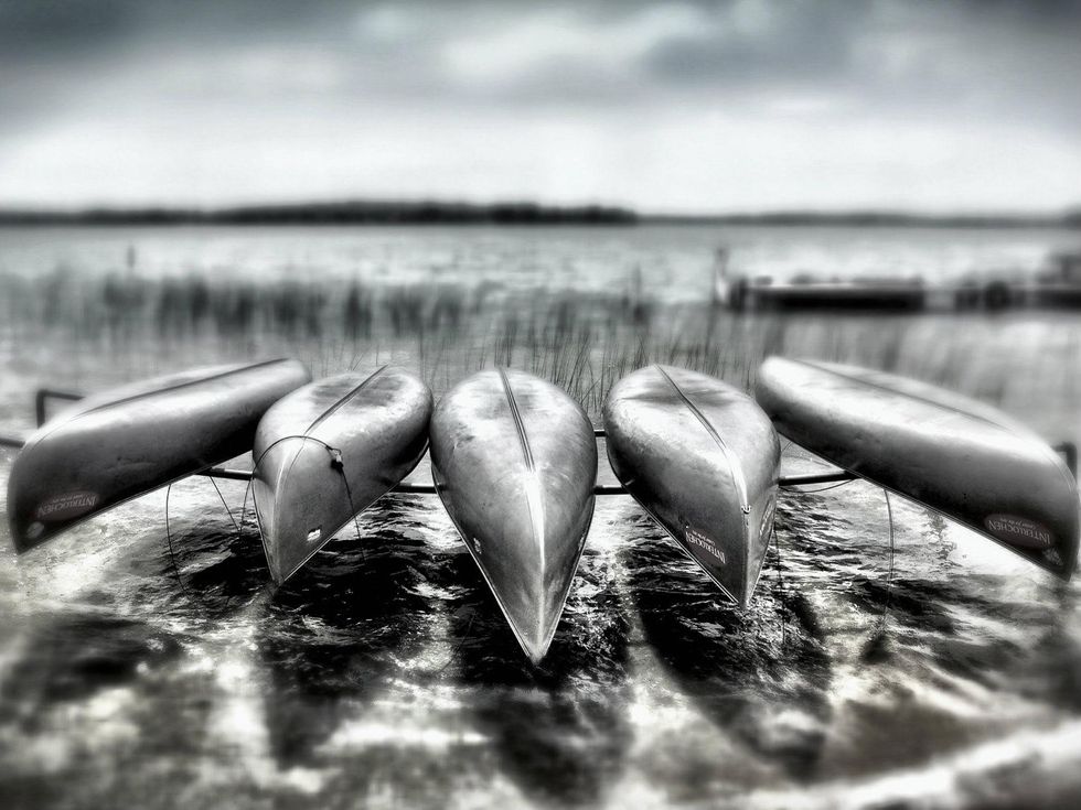 Archival pigmented ink print, "Suspended Canoes, Interlochen, Michigan," by Dan Burkholder