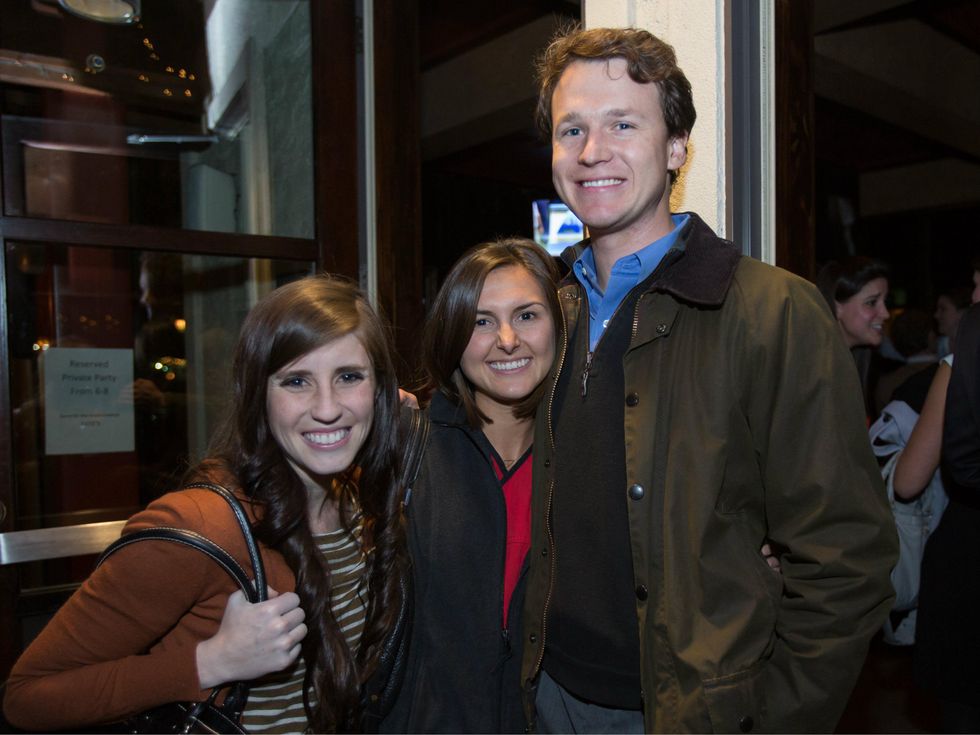 Ashley Annick , Paige Primos, Drew McWay, echelon ringing the bell