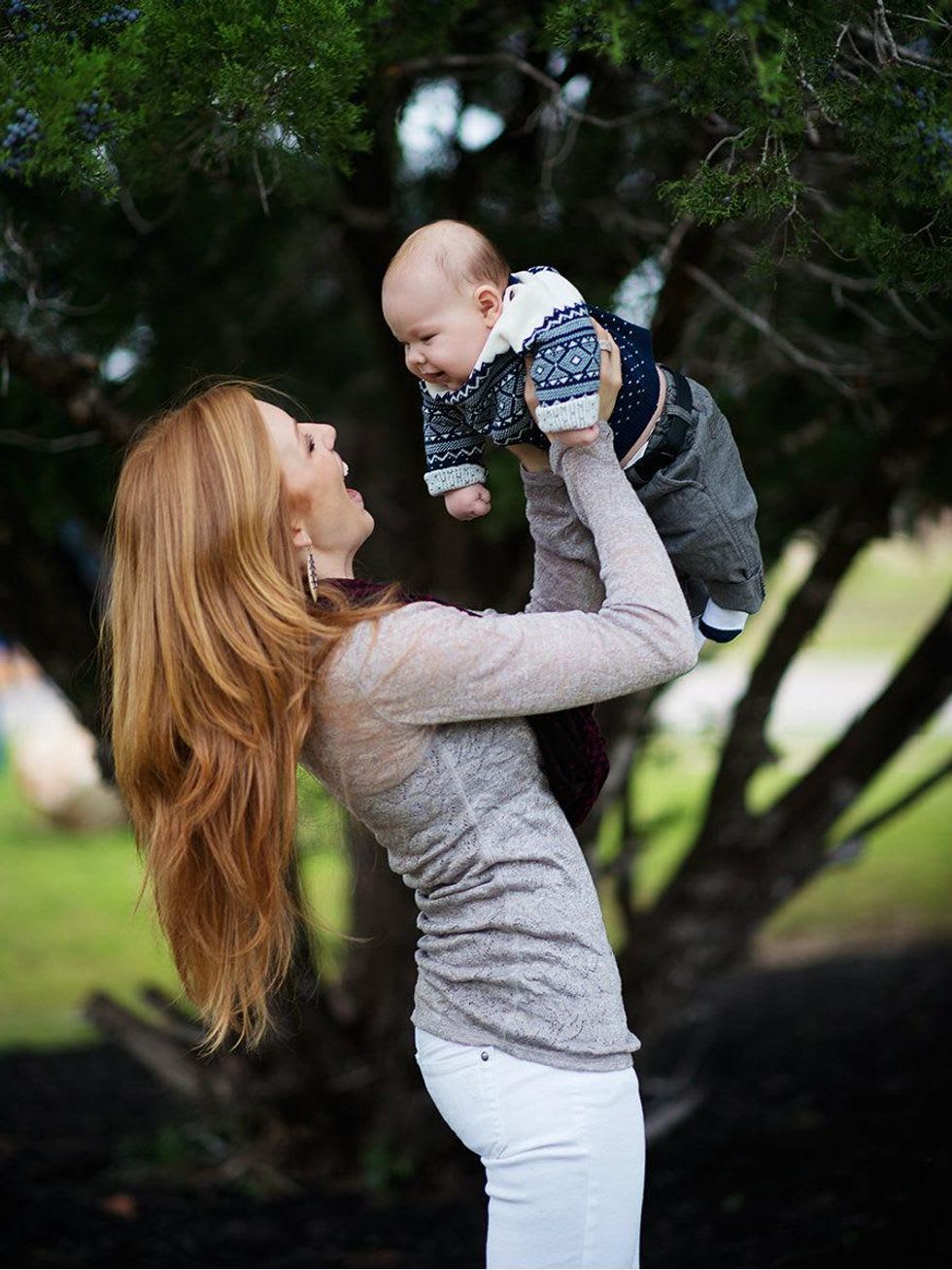 Ashley Clawson and son vert