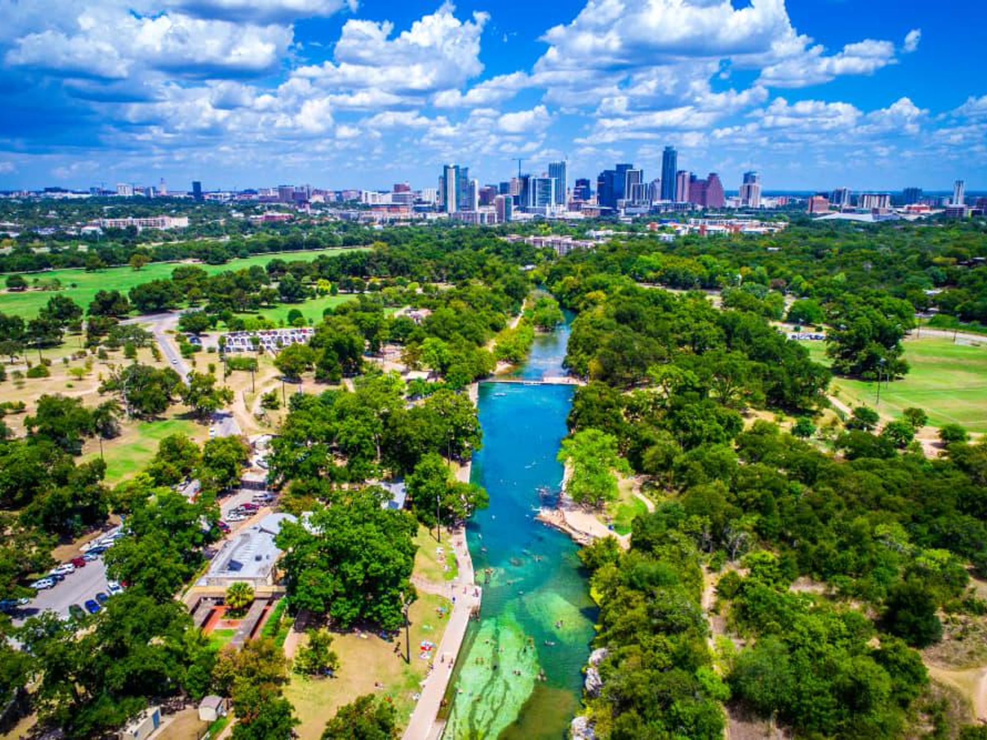 Austin skyline with Barton Springs Pool and Lady Bird Lake