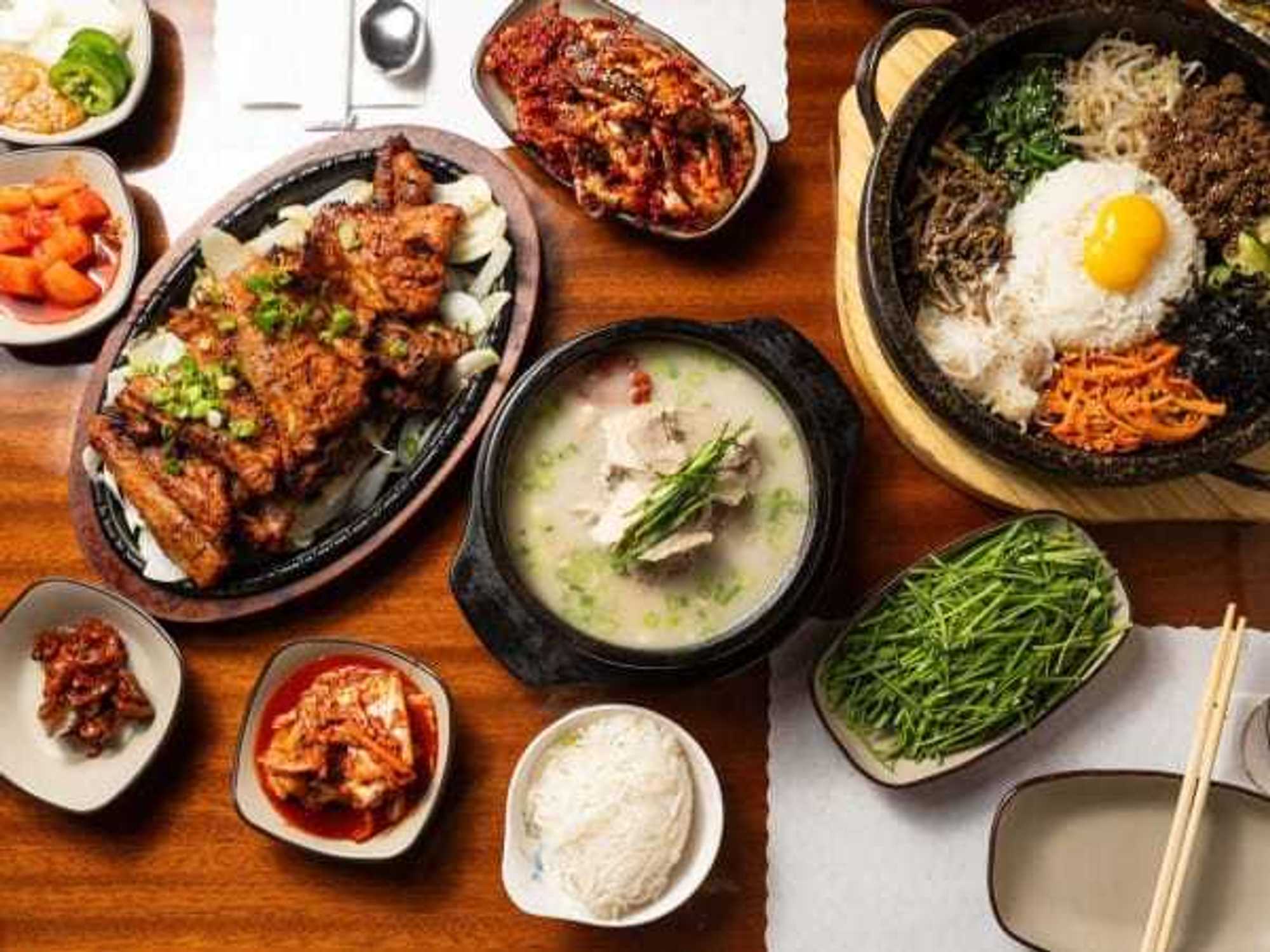 Authentic Korean comfort food meant for sharing: The diverse menu at Jinsol Gukbap highlights rich traditional broths, grilled meats, and classic side dishes.