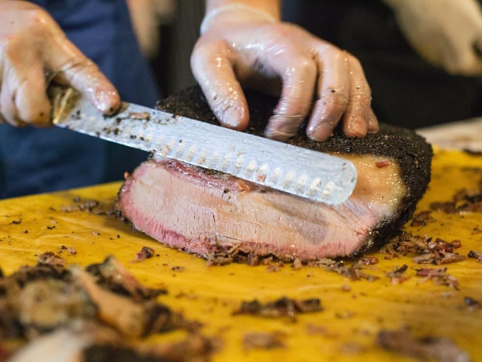 Brisket being cut at Meat Fight 2015