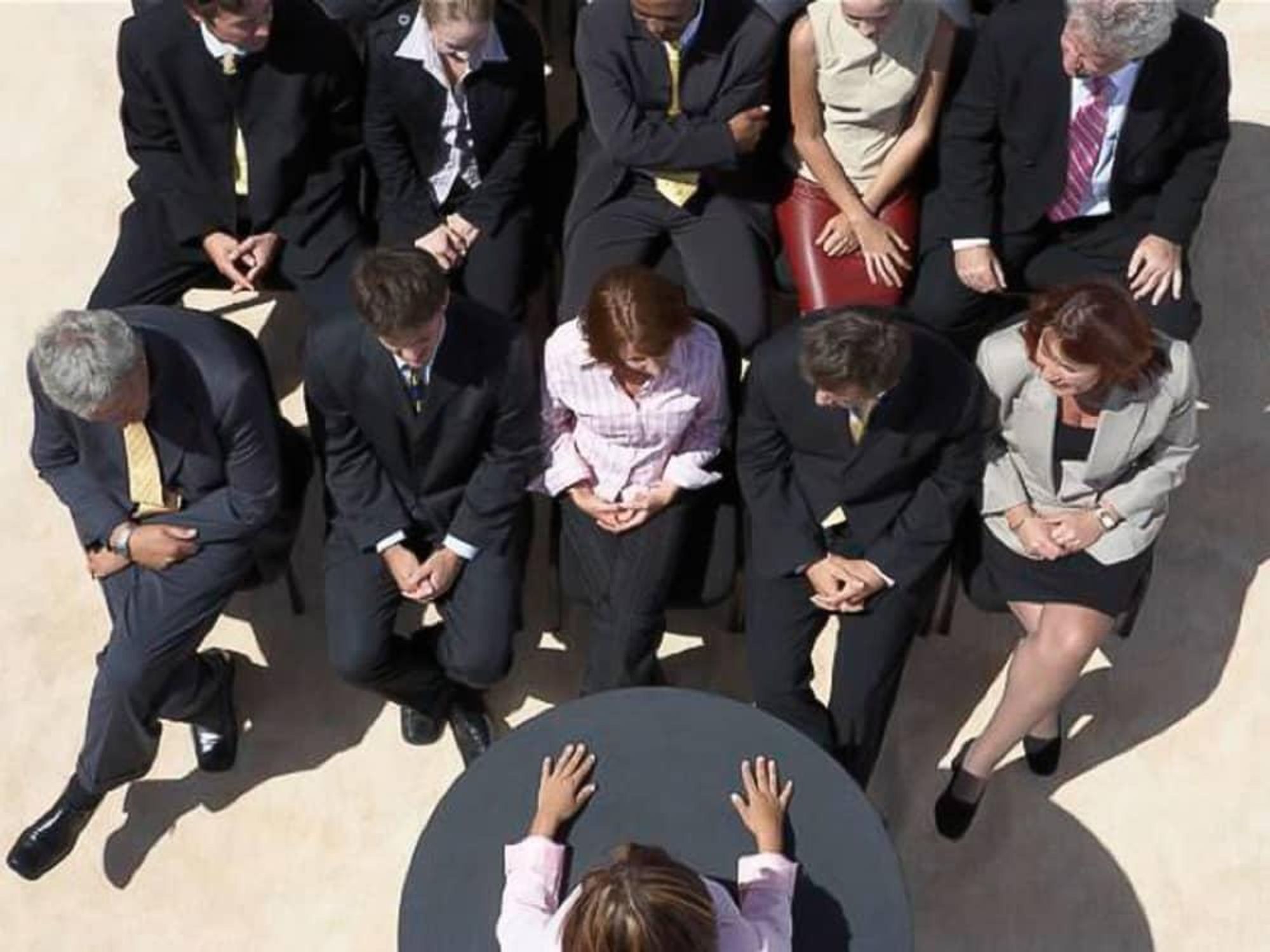 Business men and women at a seminar