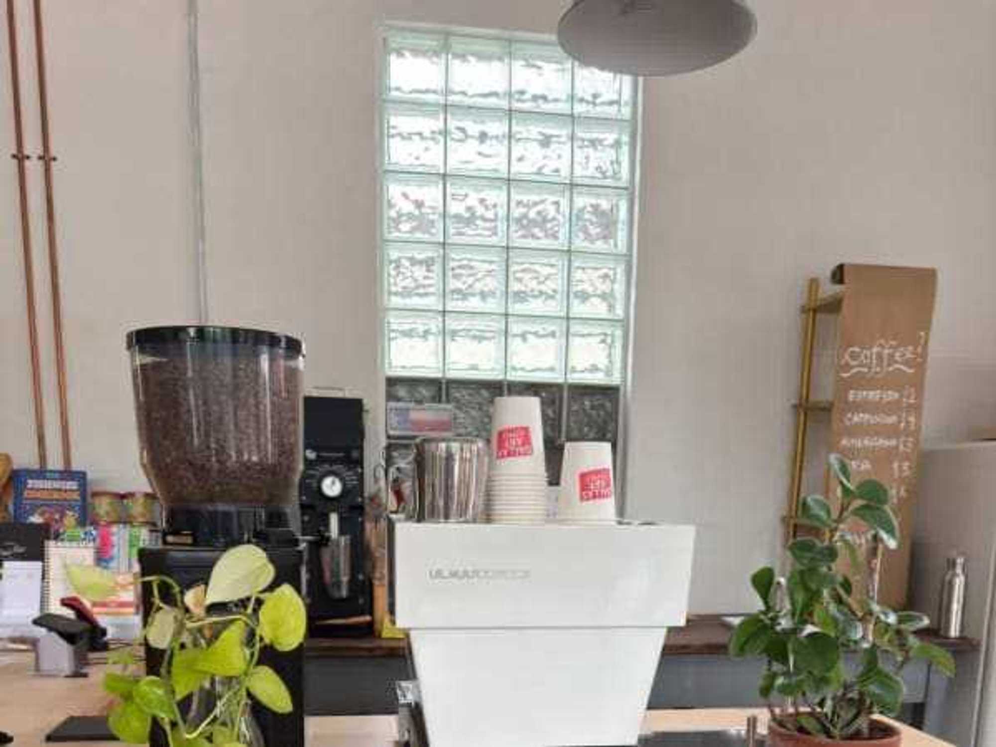 Canvas, caffeine, and community. Happening Café is officially open (and perfectly tucked away) inside Dallas Art Supply.