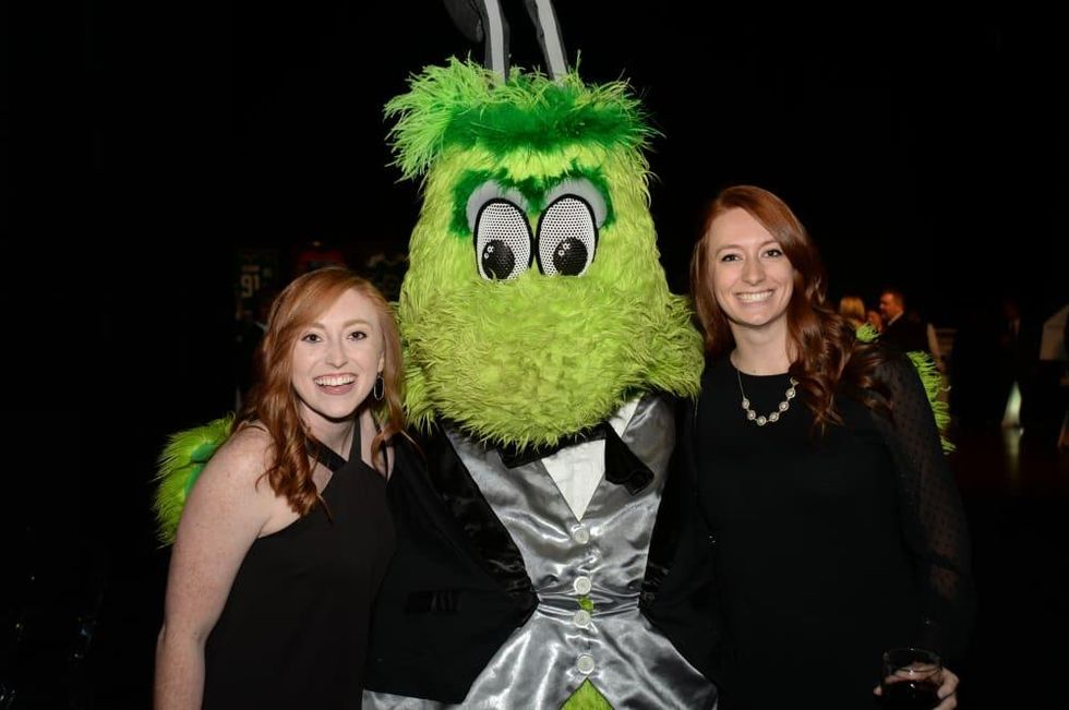 Cassidy Clark and Sydney Bedford with Stars mascot Victor E. Green
