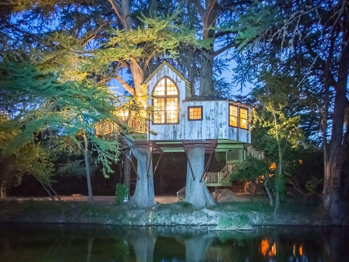The French cathedralinspired Chapelle treehouse at Treehouse Utopia sits over the Sabinal River