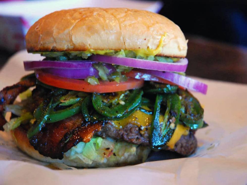 Cheeseburger with bacon and jalape\u00f1os at Maple & Motor in Dallas