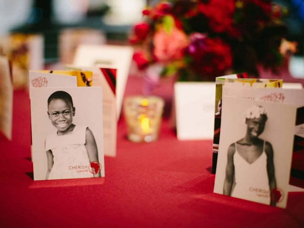 Cherish cards featuring children in Uganda add a personal touch to the table decor