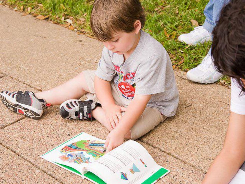 Child reading a book