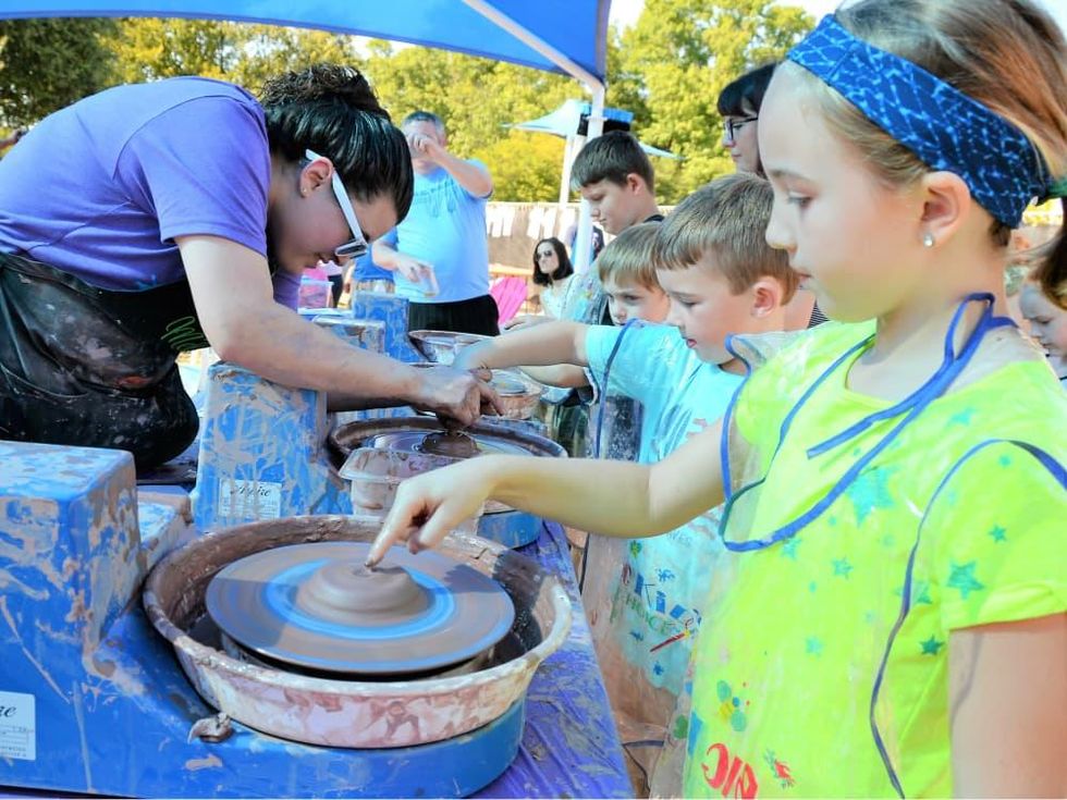 Children making pottery at Cottonwood Art Festival