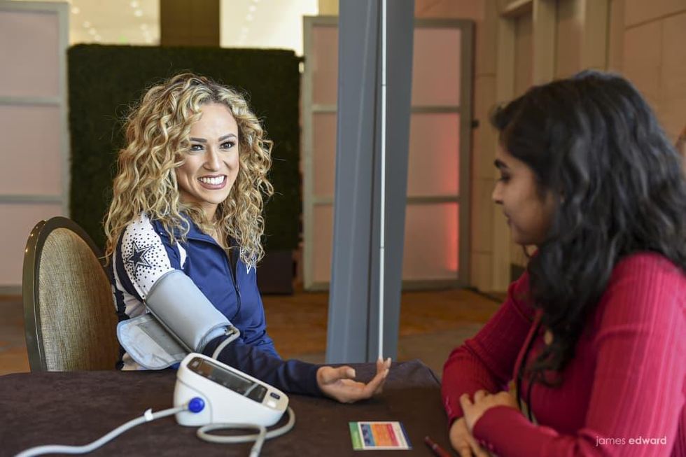 Cianna Levi gets her blood pressure checked.