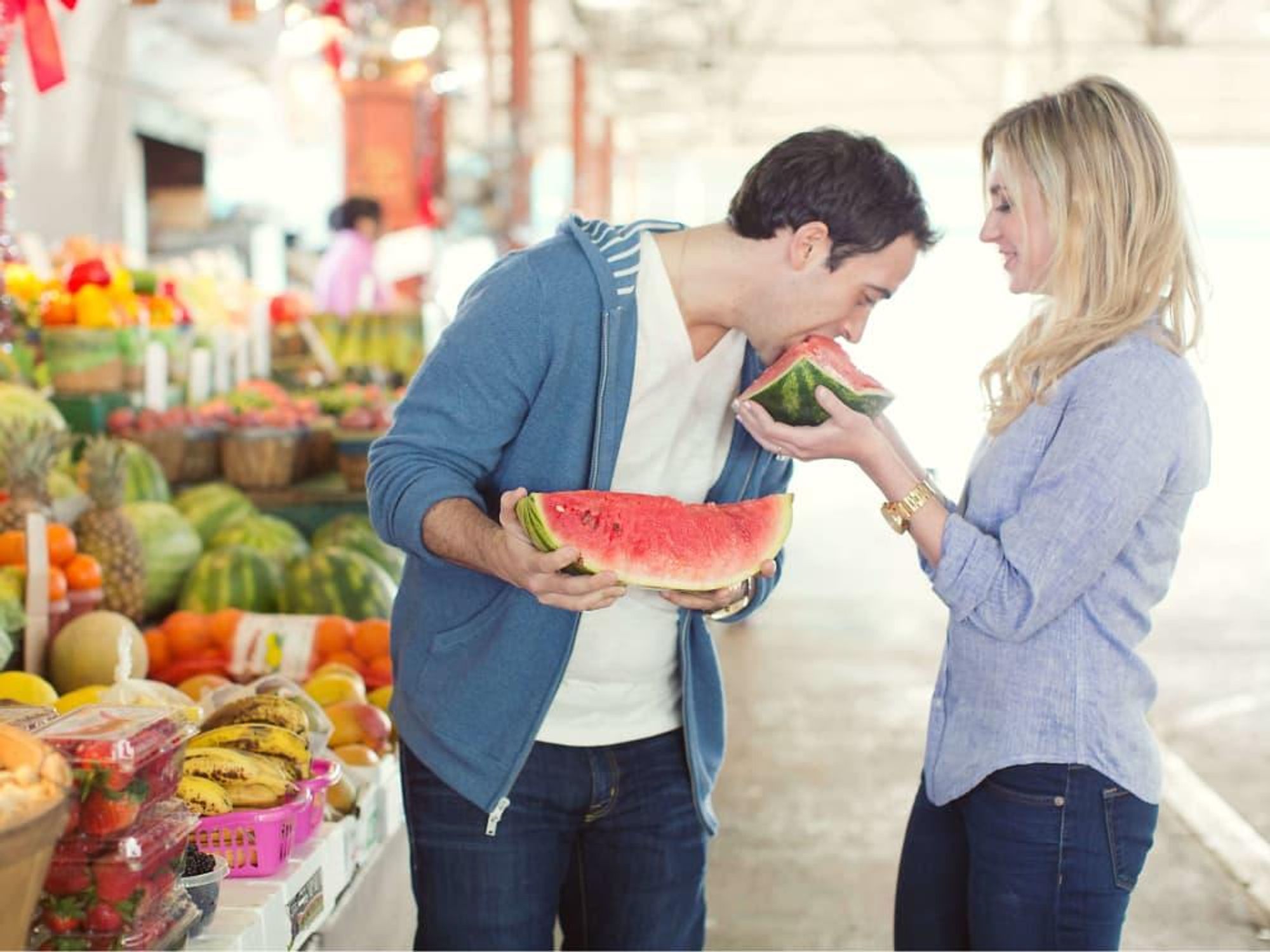 Couple eating watermelon