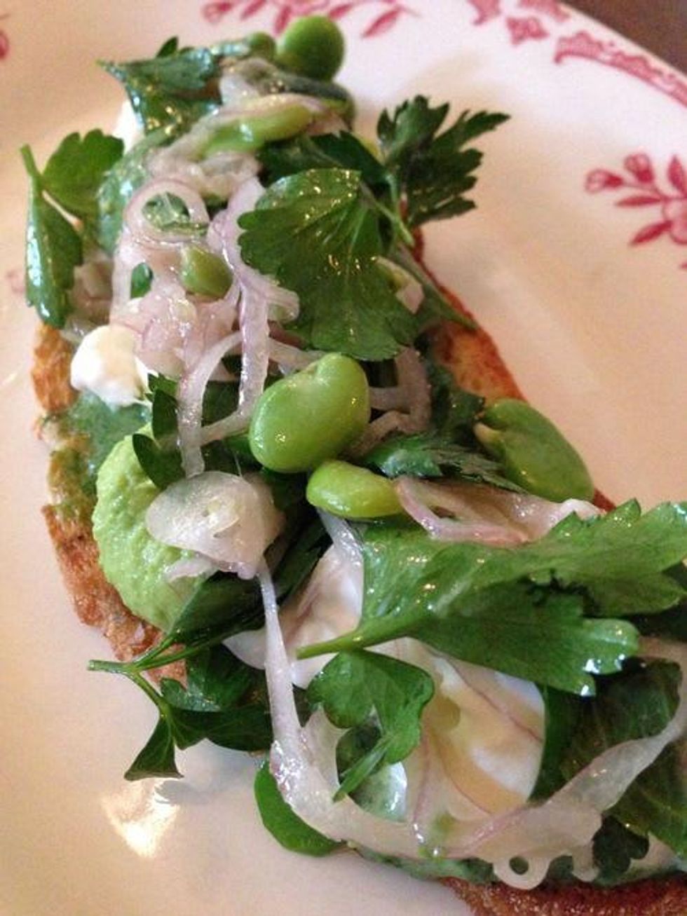 Crostini with fava bean and shallot at Lucia restaurant in Dallas