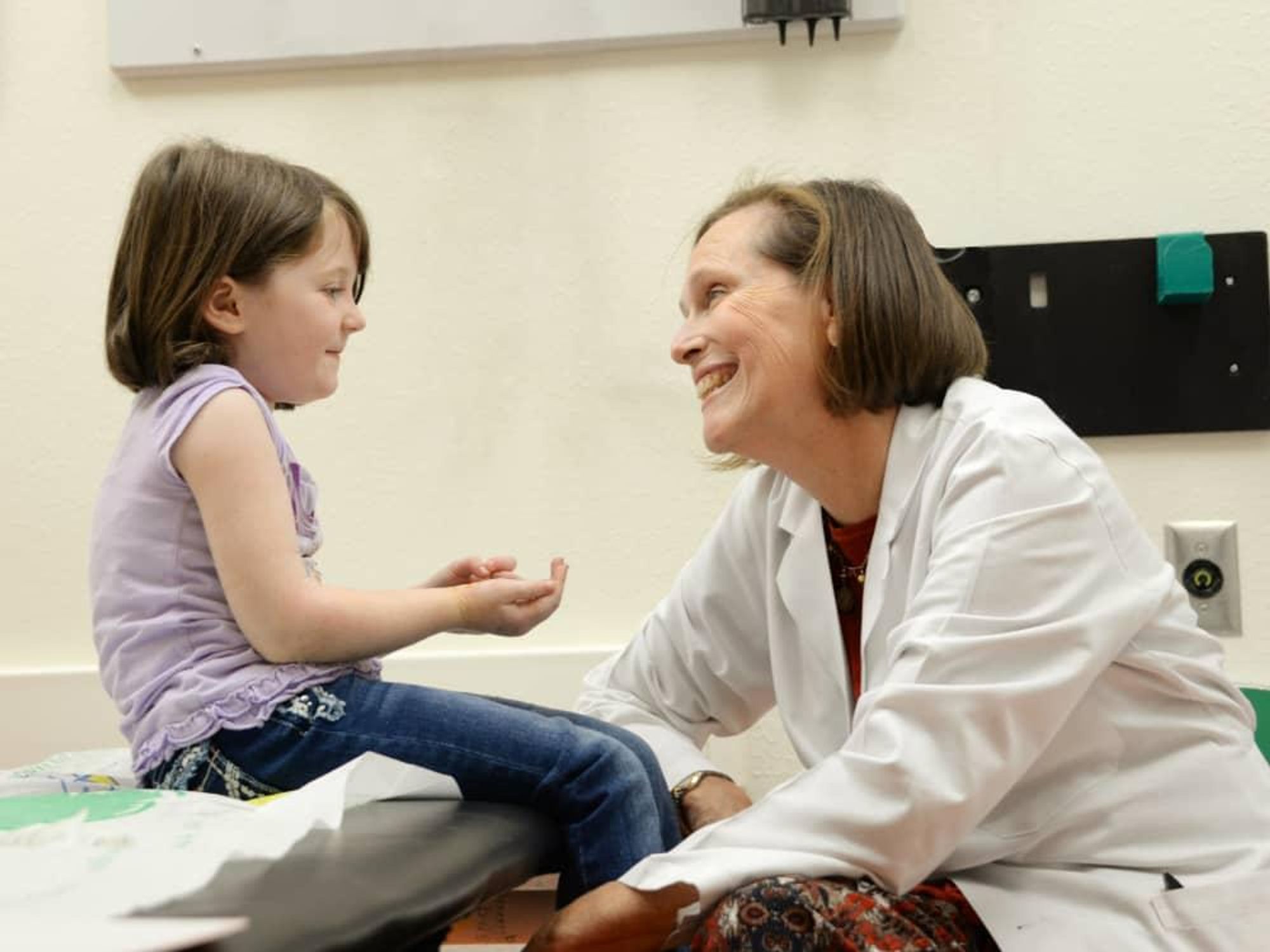 Doctor and little girl