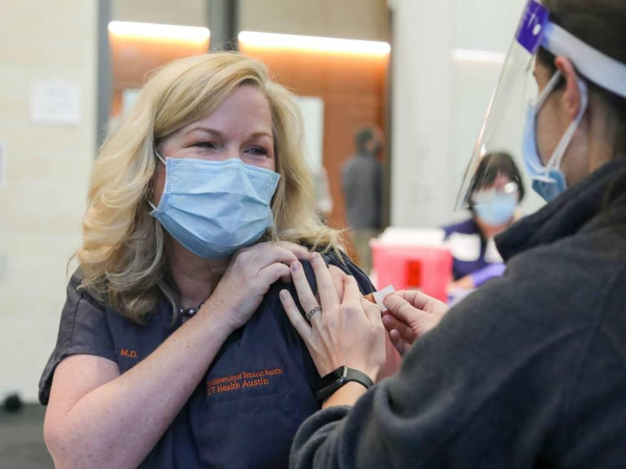 Doctor getting COVID-19 vaccine