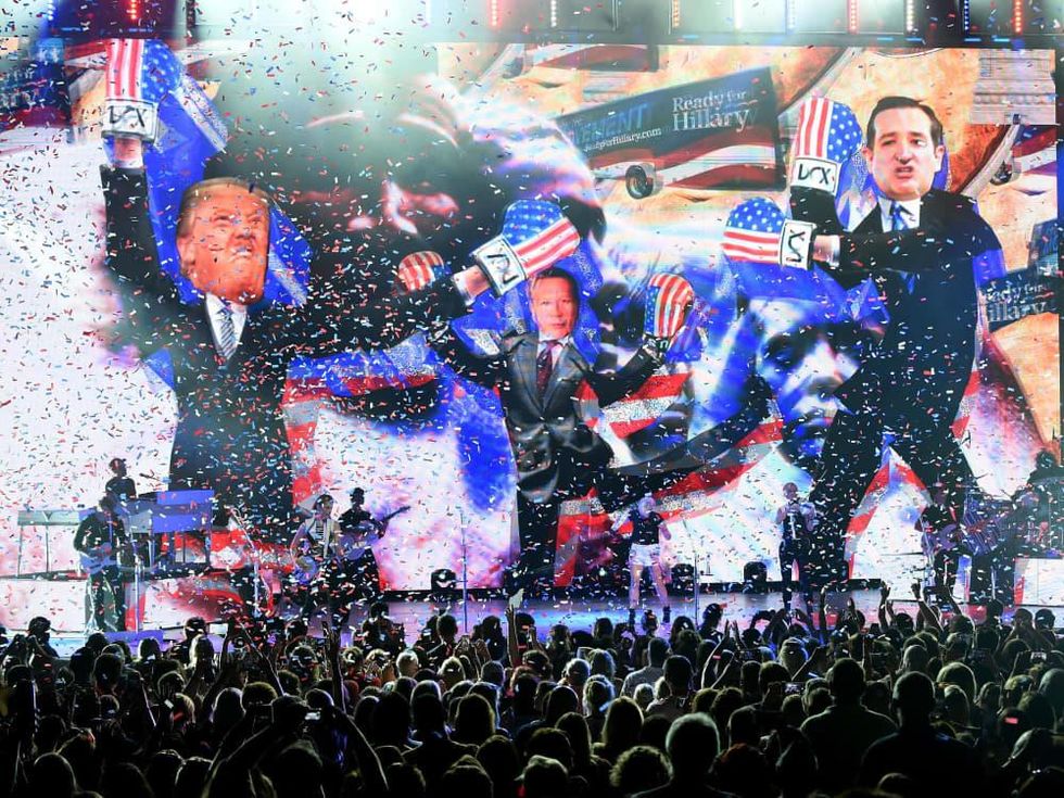 Donald Trump and Ted Cruz on screen during Dixie Chicks concert