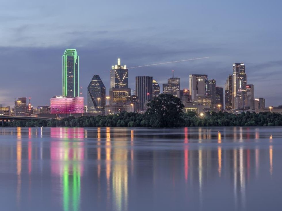Downtown Dallas behind flooded Trinity River