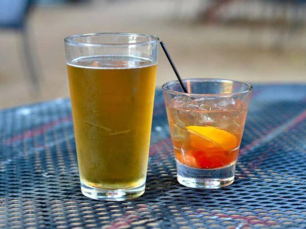 Drinks on a patio table at Eight Bells Alehouse