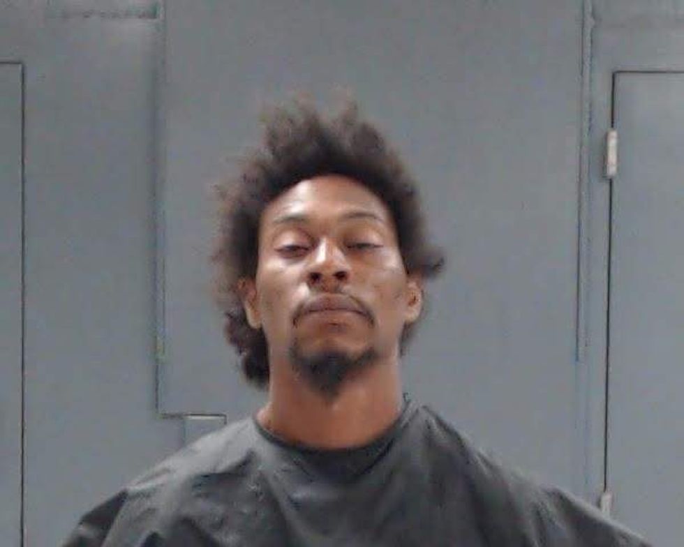 Eferm Robinson mugshot animal cruelty