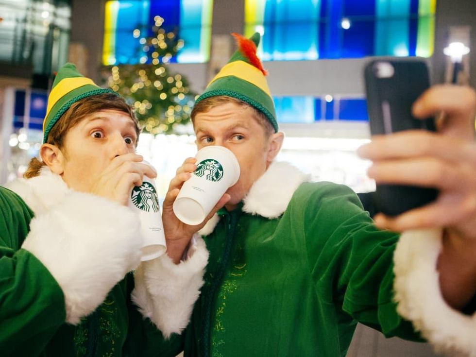 Elves with lattes taking selfies
