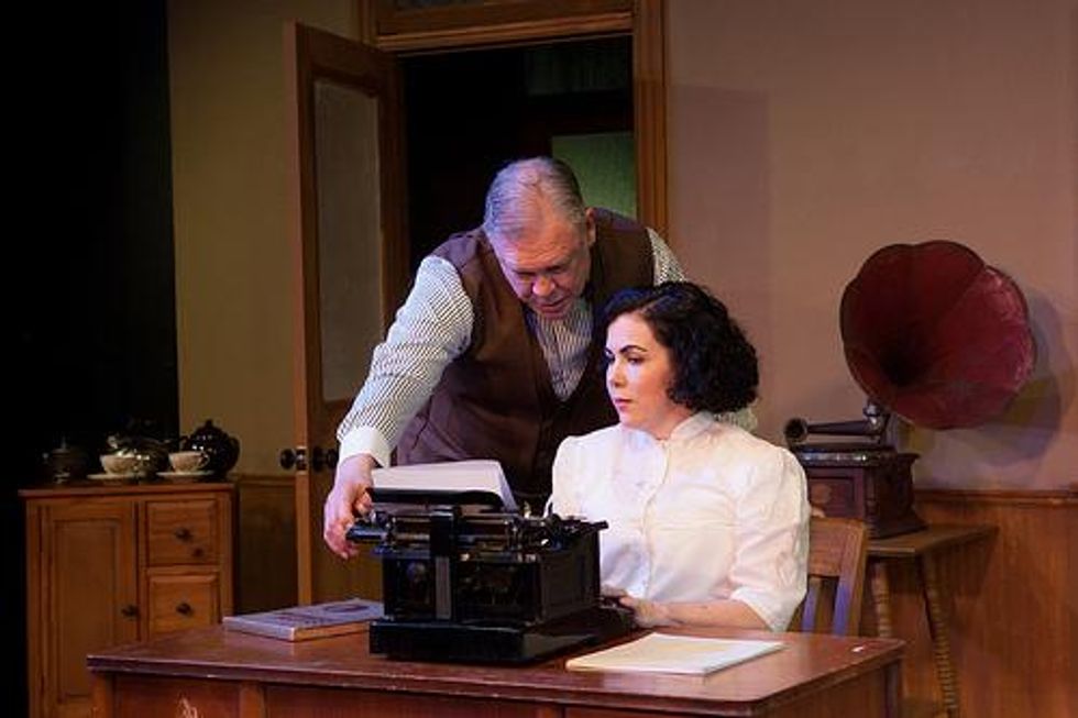 Emily Scott Banks and John S. Davies communicate in "Ghost-Writer" at Circle Theatre in Fort Worth.