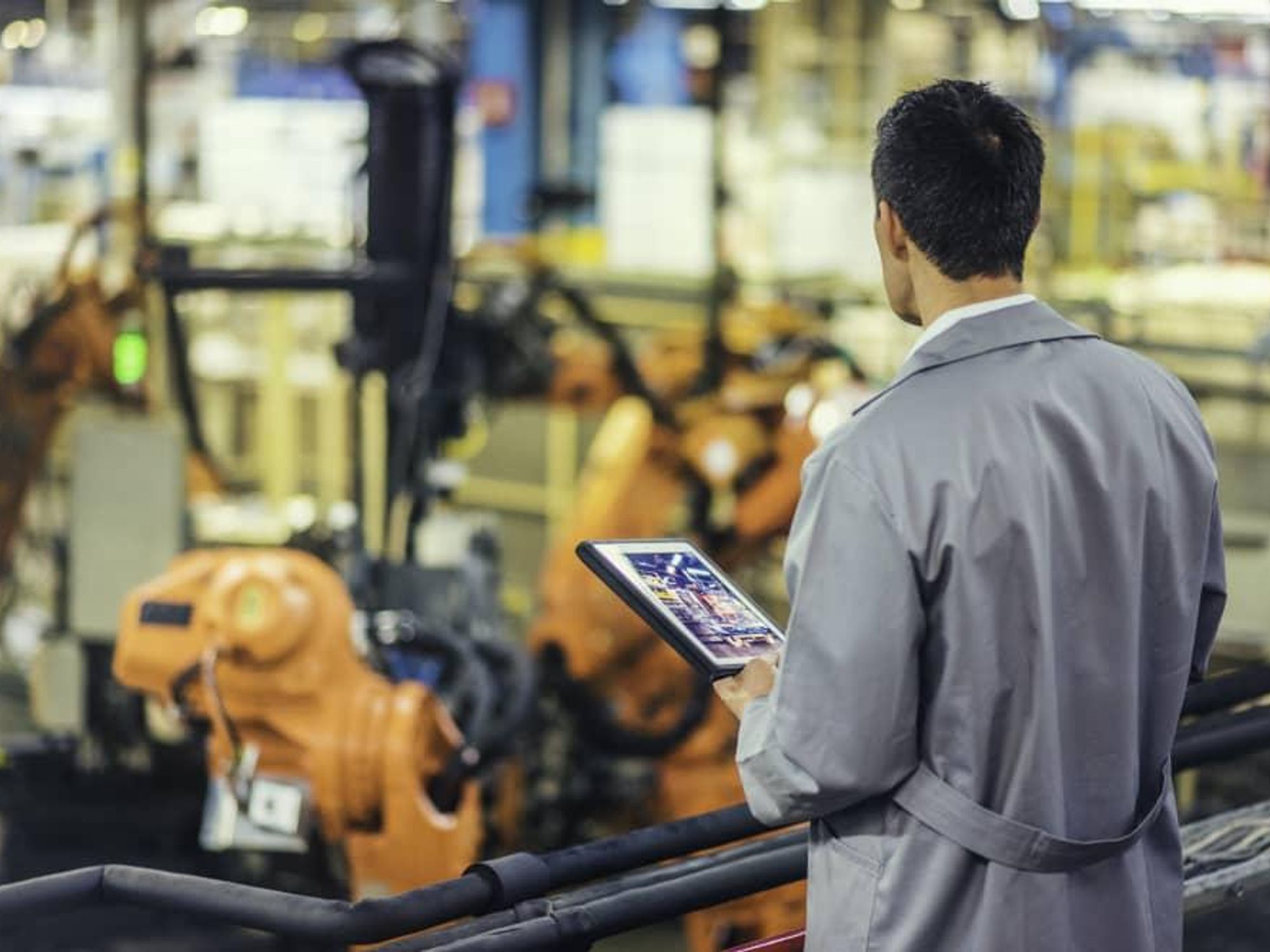 Engineer overseeing automated production