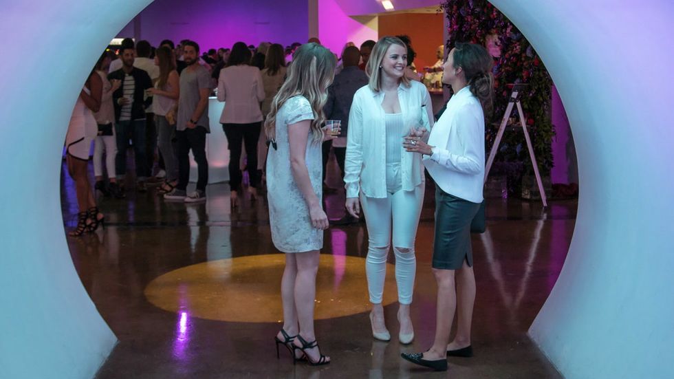 Hot young professionals paint the town at Dallas’ most colorful mixer