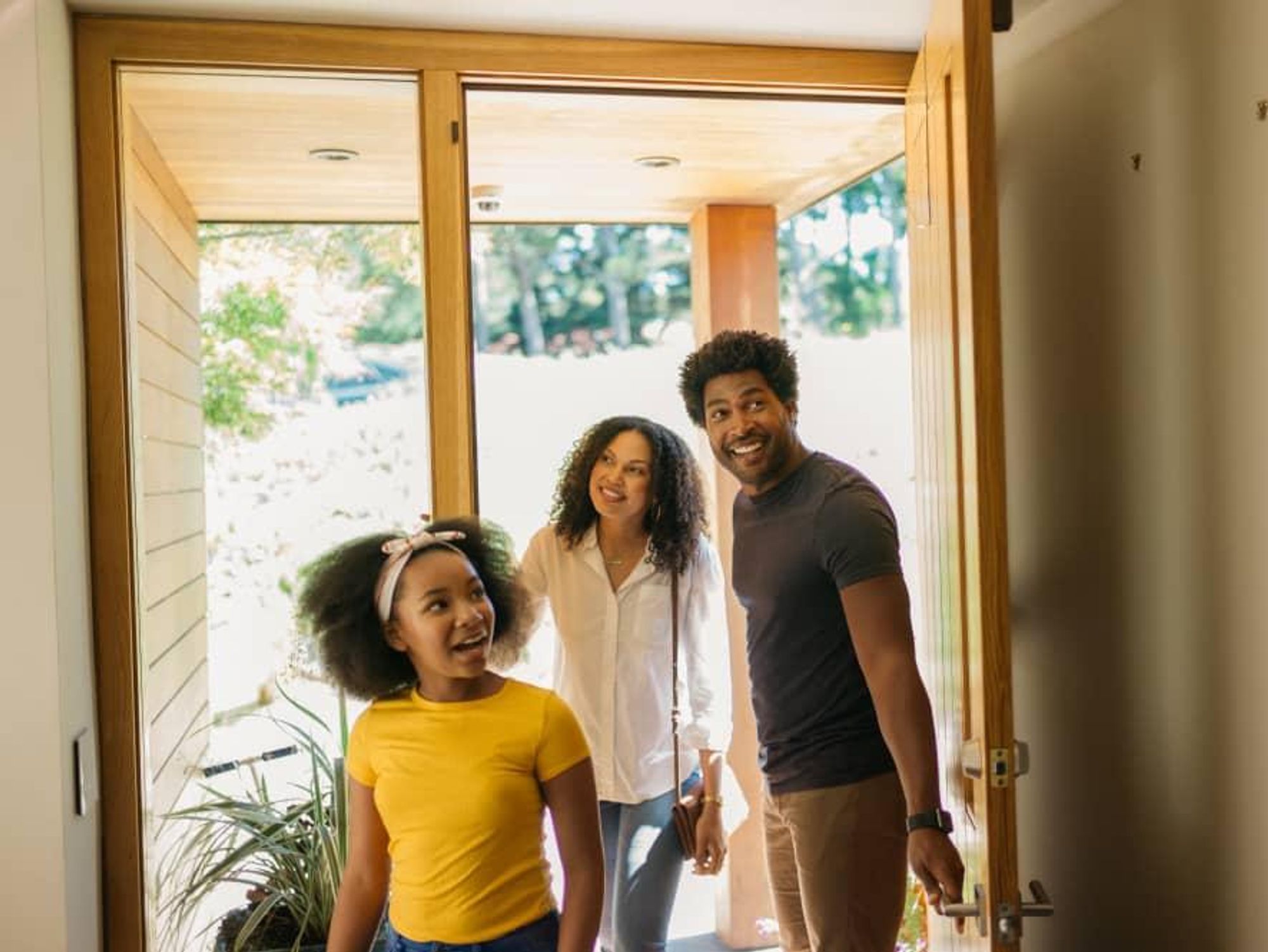 Family going into new home