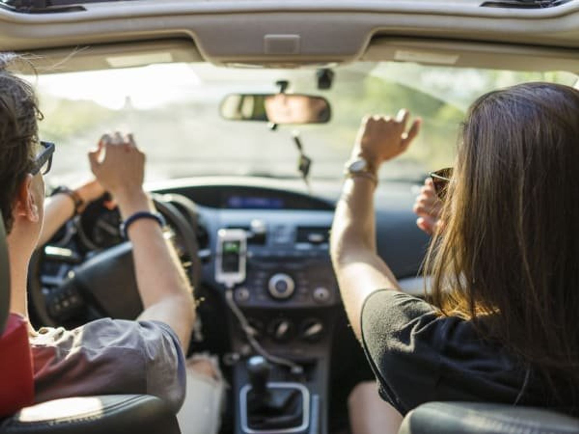 Friends driving road trip