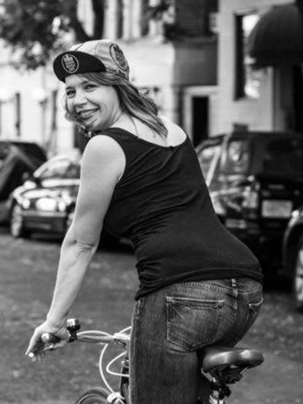 Girl on bike for Local Hub in Deep Ellum