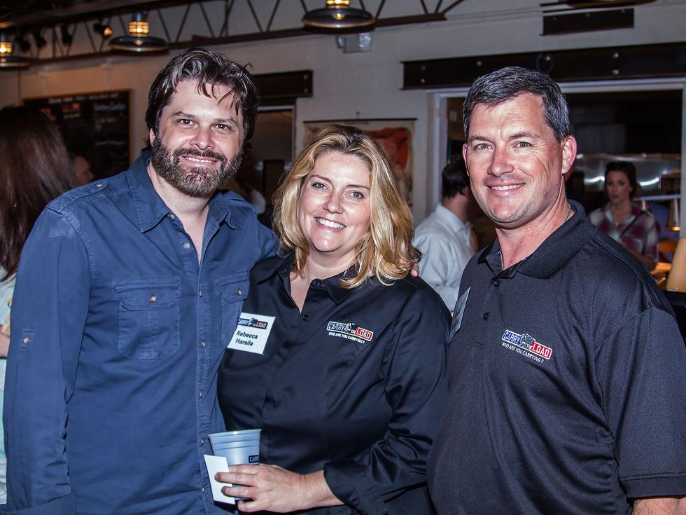 Gordon Keith, Rebecca Harsila, Todd Boeding at Carry The Load fundraiser dinner at Pecan Lodge