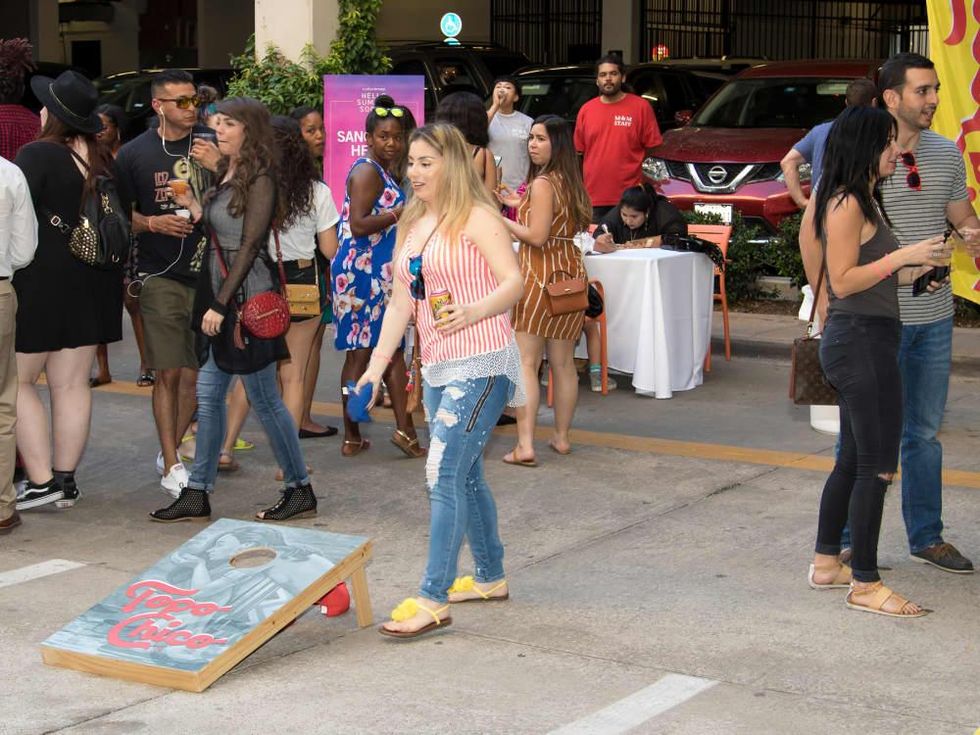 Guest playing corn hole toss
