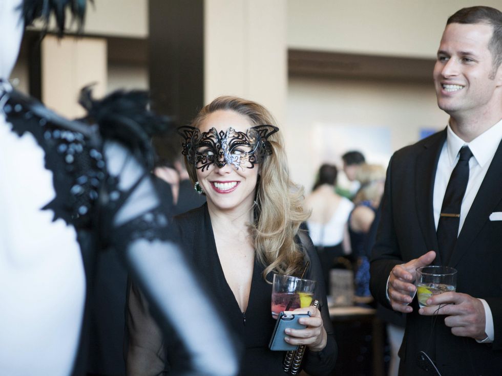 Guests at silent auction at House of DIFFA 2014