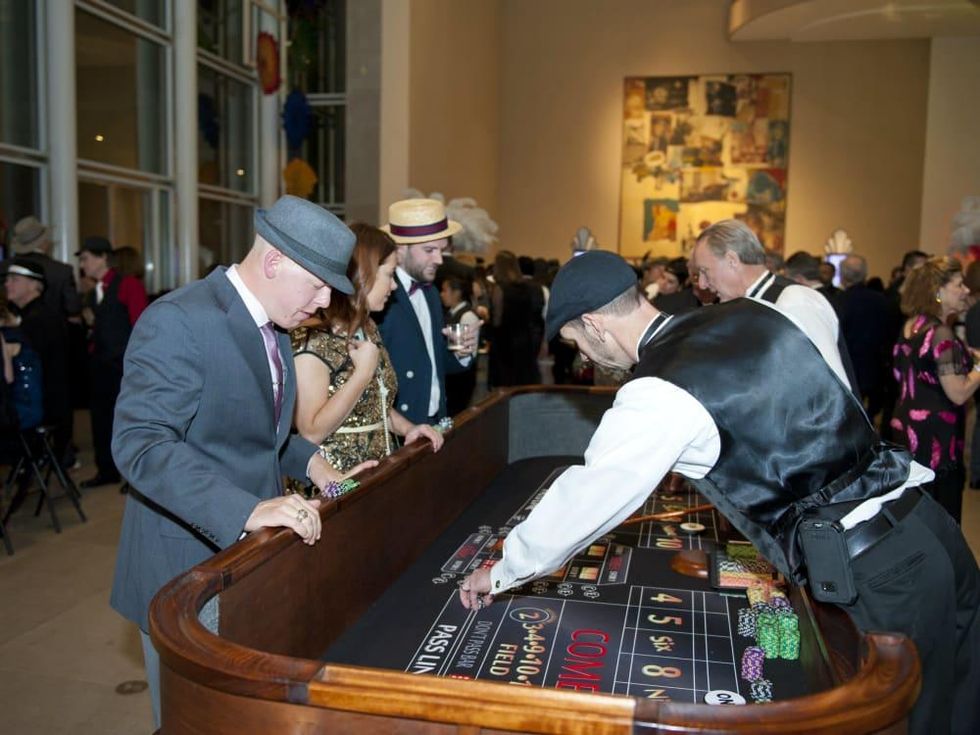 Guests playing casino games at DMA Speakeasy