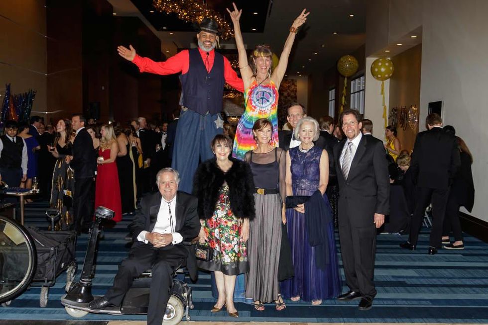 Guests with stilt walkers