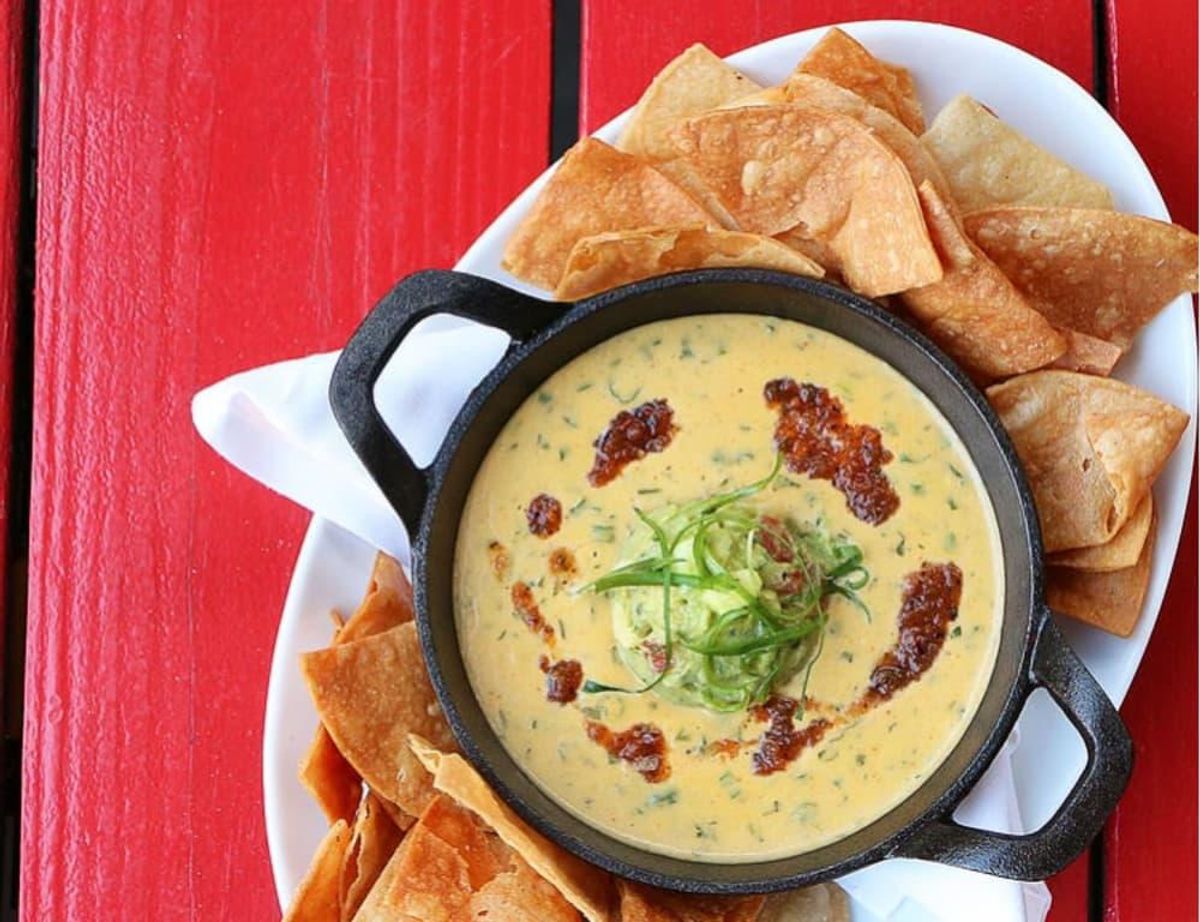 HG Sply Co. serves thick chips with its queso, made inhouse