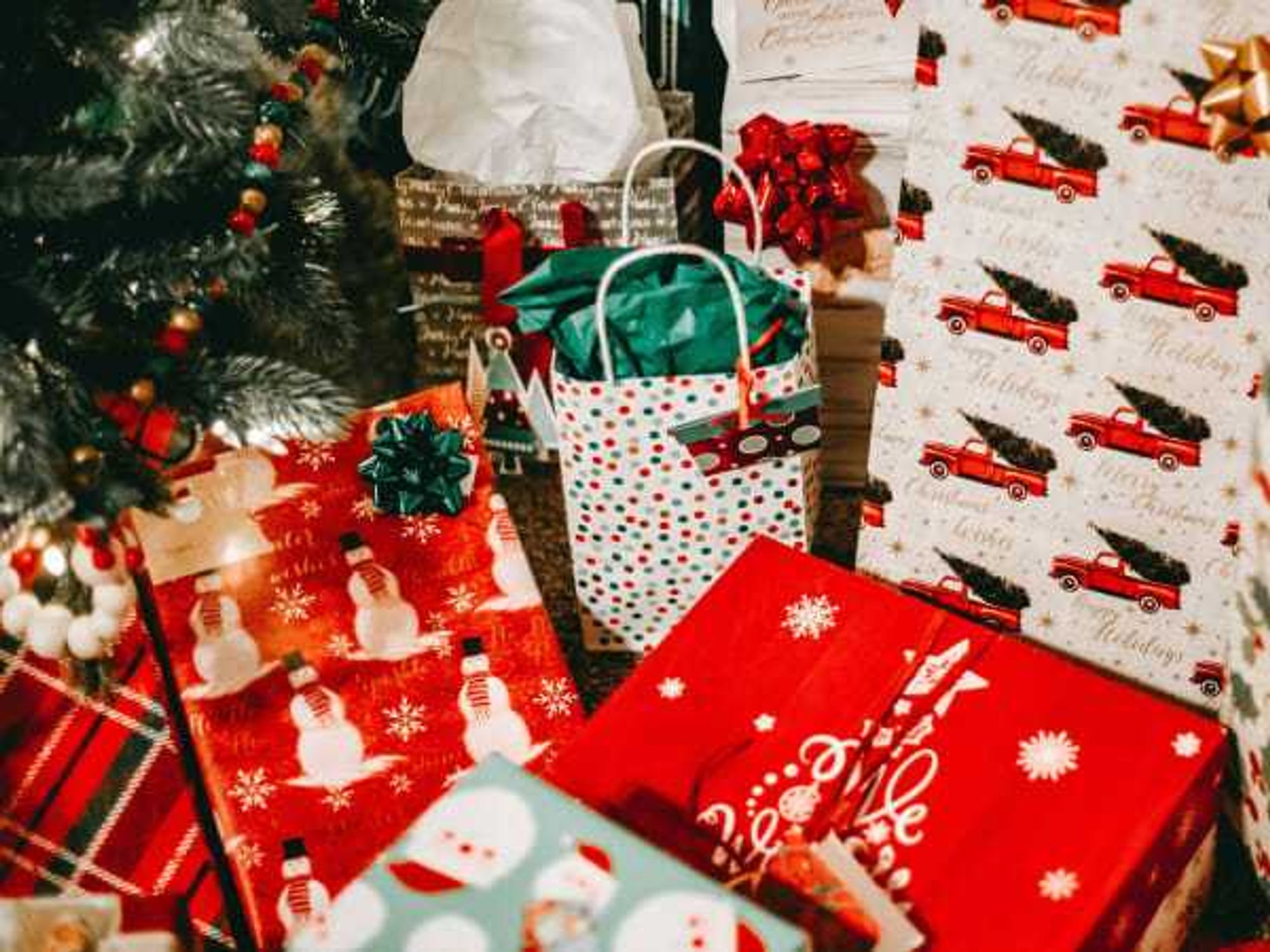 holiday shopping in 2025, Christmas presents wrapped under a tree