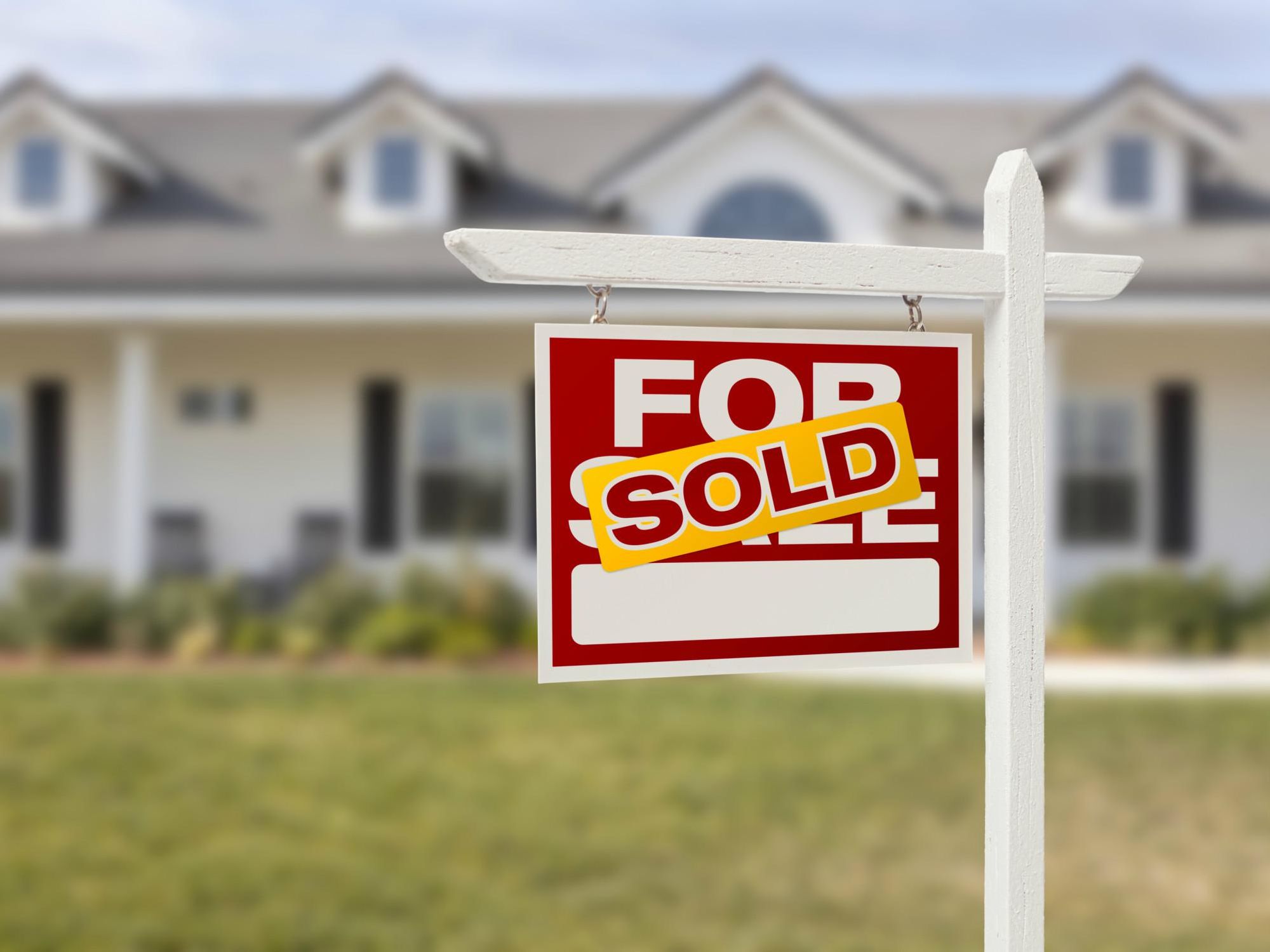 Home for sale sold sign