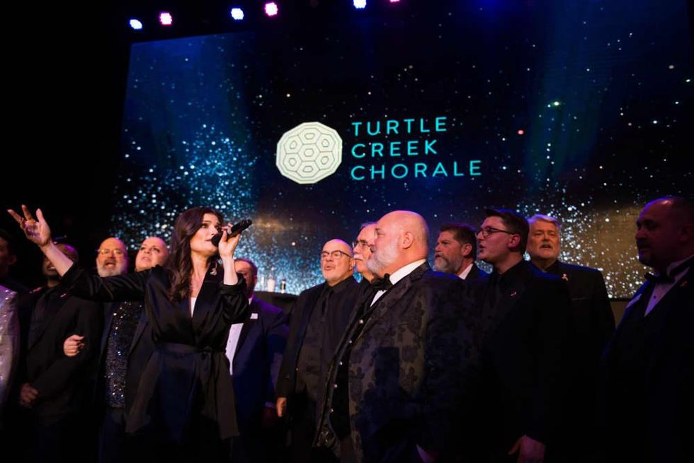 Idina sings "Seasons of Love" and "No Day But Today" with the Turtle Creek Chorale.