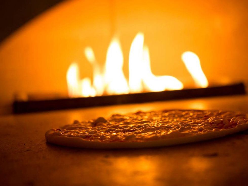 il Mascalzone pizza in wood-burning pizza oven London