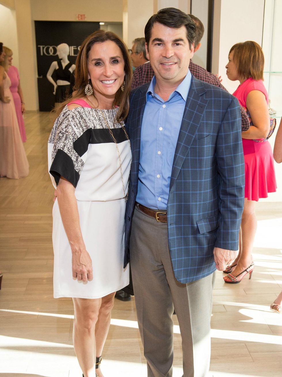 Jenny and Brett Robertson, suits for shelter