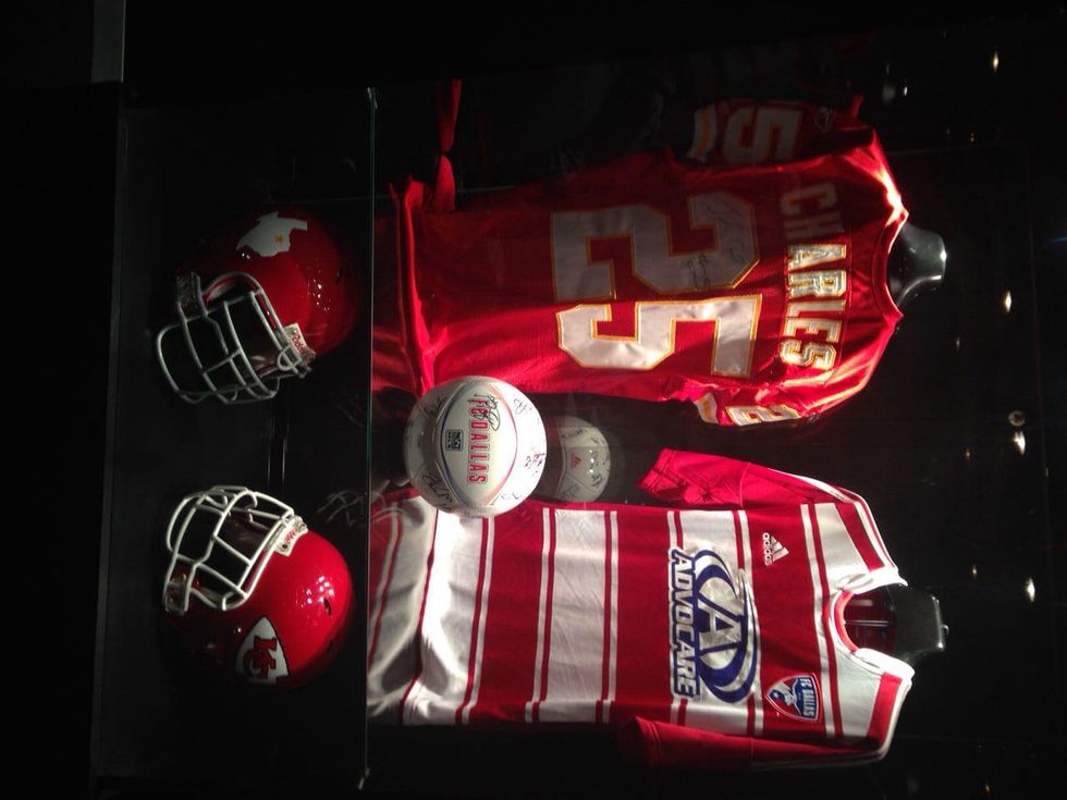 Jerseys and helmets in Lamar Hunt Family Sports Hall at Perot Museum of Nature and Science